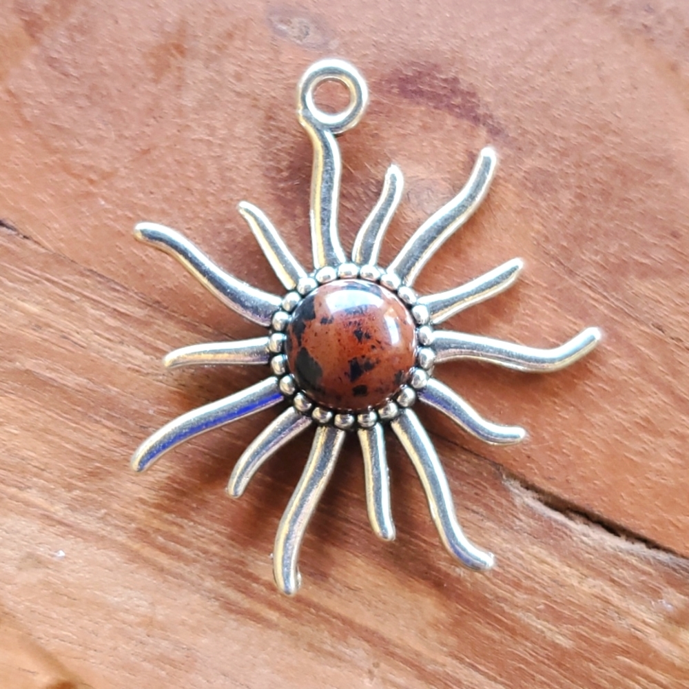New Mahogany Obsidian Silver Sun Pendant.